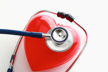 A heart with a stethoscope, isolated on white background