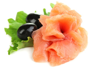 Sliced and rolled salmon, black olive and herbs isolated