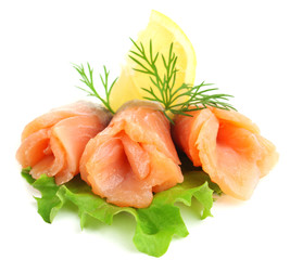 Sliced and rolled salmon  with lemon slice