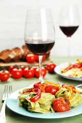 Tasty pasta with pepper, carrot and tomatoes