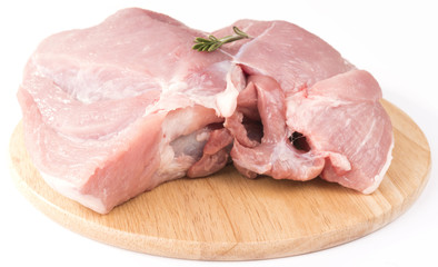 bonless pork on wooden board. isolated on white background.