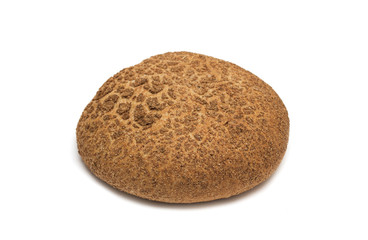 Round brown bread. Photo.