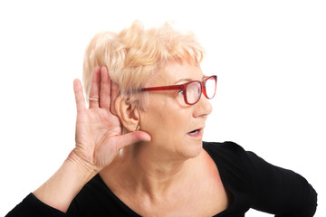 Old woman overhearing someone