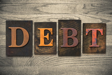 Debt Concept Wooden Letterpress Type