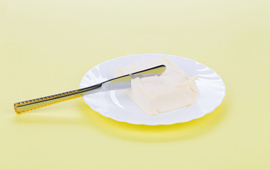 Fototapeta na wymiar Stick of butter
