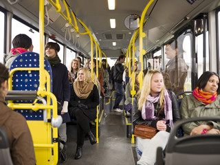 People in a bus - obrazy, fototapety, plakaty