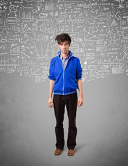 Young handsome guy with hand drawn calculations and icons