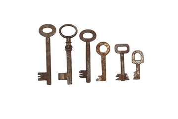 collection of old rusty keys, isolated on white