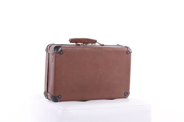 Vintage Suitcase bag old over a white background
