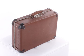 Vintage Suitcase bag old over a white background