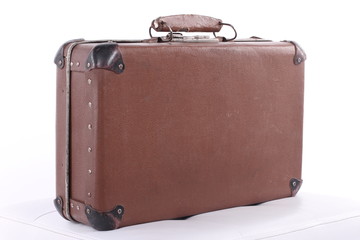 Vintage Suitcase bag old over a white background