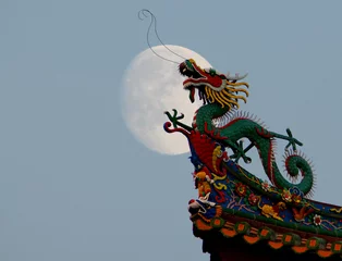 Foto op Canvas Traditional chinese dragon on a background of  the full moon © katoosha