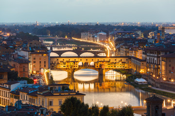 Fototapeta na wymiar Arno River and bridges Ponte Vecchio