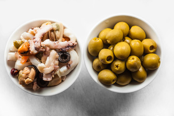 mix of seafood and green olives