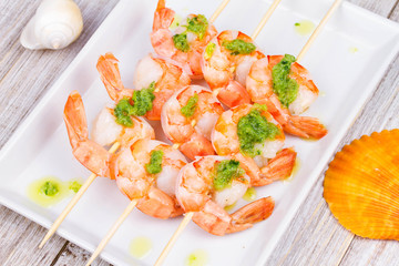 Ready to eat shrimps with green butter