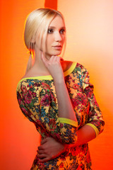 Fashion portrait of blonde woman with make-up and hairstyle