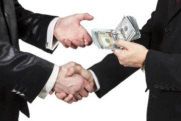 Handshake with the transfer of money