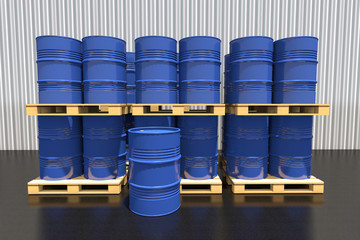 Metal barrels of fuel on a pallet are in the industrial warehous