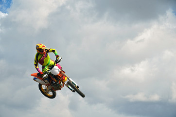 MX rider on a motorcycle in the air