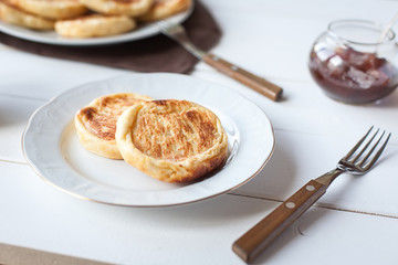 breakfast with cheese pancakes, coffee and jam