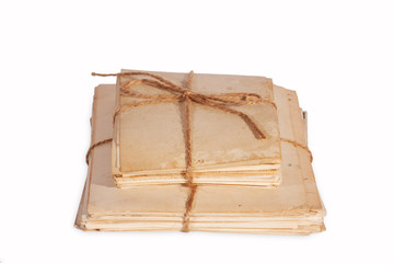 Stack of old papers on white background