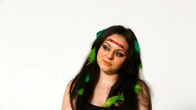 beautiful young woman face close up with hippie art make up