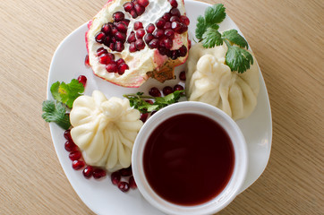 khinkali with pomegranate sauce