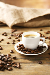 Cup of coffee on wooden table