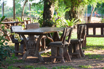 Table and chairs on the lawn.