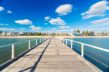 Long exposure shot of jetty in a beach