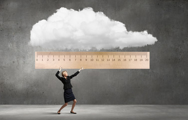 Woman with huge ruler