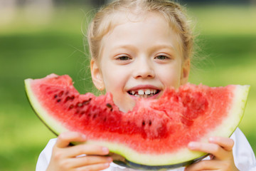 Girl eating watermelon