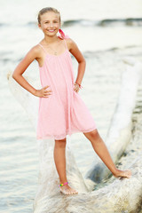 Fototapeta na wymiar Portrait of lovely, fashion girl on the beach