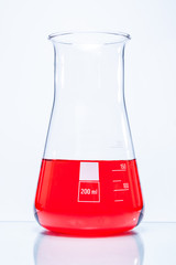 Conical temperature resistant flask with red liquid