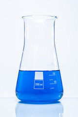 Conical temperature resistant flask with blue liquid