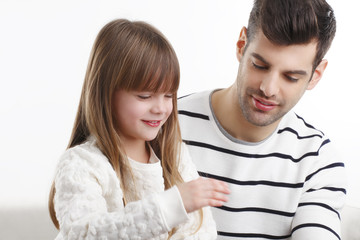 Young father and his daugther