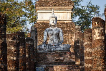 Fototapeta premium Back of Old buddha statue in Sukhothai Historical Park