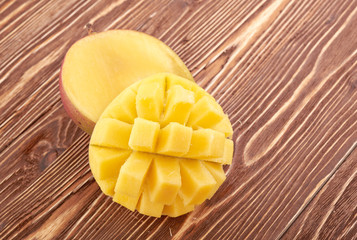 Mango fruit on wood