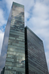 Fototapeta na wymiar High modern buildings of glass and steel