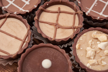 Dark chocolate on wooden background