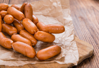 Small Sausages on wood