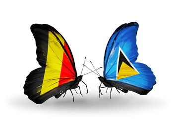 Two butterflies with flags Belgium and Saint Lucia