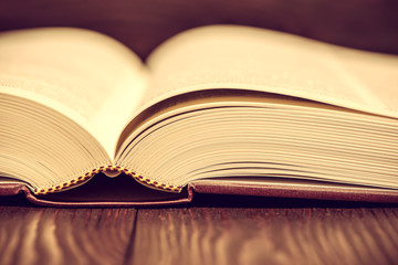 Vintage book on wooden background