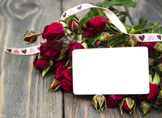 Red rose and greeting card