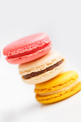 Colorful French pastry on a white background.