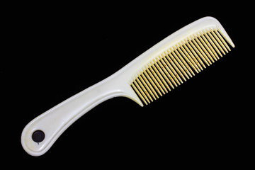 old white comb on  background