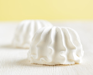White marshmallow on wooden table