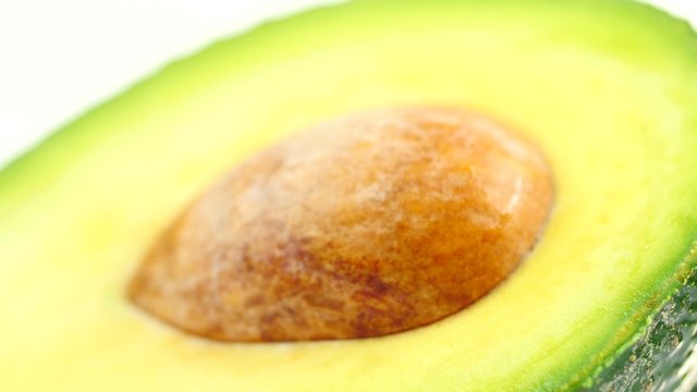 Rotating Avocado on white background
