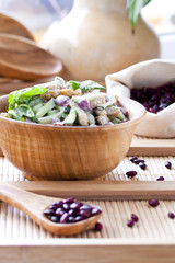 salad with beans, bacon, cucumber and croutons