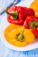 Fresh roasted red and yellow peppers